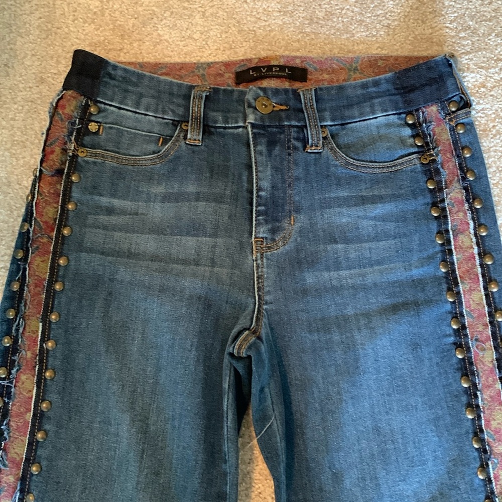 Very unique LVPL jeans. Great contrasting stripe and studs on legs.